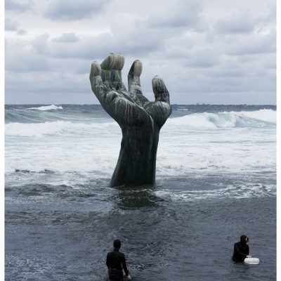 The hand in the water